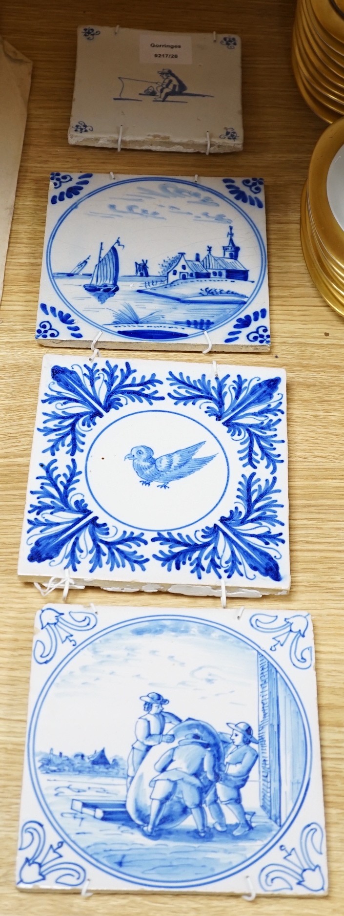 A collection of Delft and other blue and white tiles, 18th century and later (4)